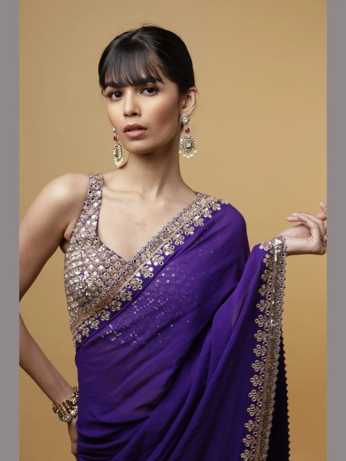 Presenting Heavy Faux Georgette Saree With Sequence Work