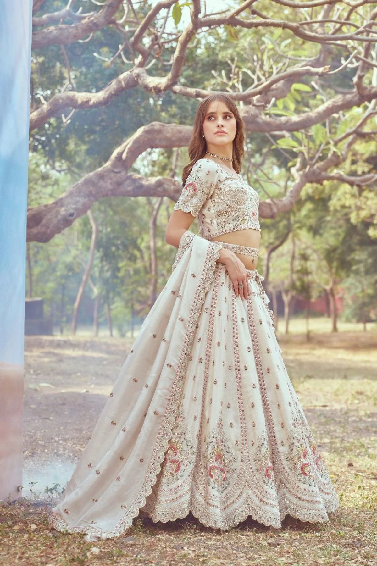 Surat Premium Bridal Tissue Lehenga Heavy Cream Set with Zari, Stone & Beads Work Latest Exporter Design at Wholesale Price